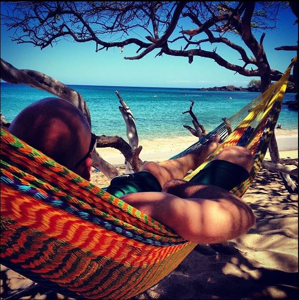 Joshua Cabe Johnson - Singer Songwriter and Musician relaxing in a hammock